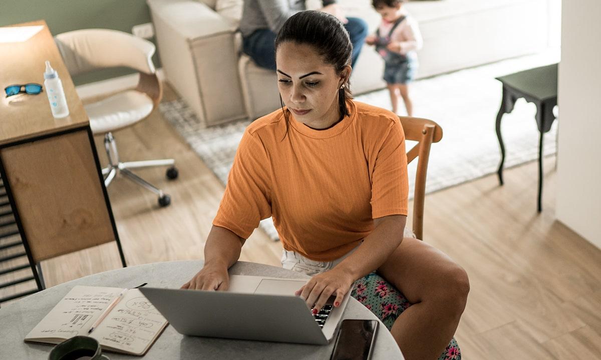 Female engineer works from home and connects with colleagues virtually