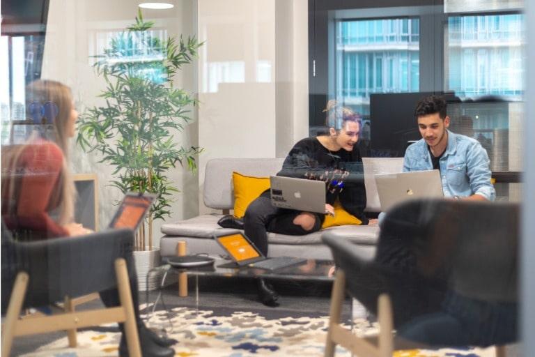 Two engineers work together in a co-working space